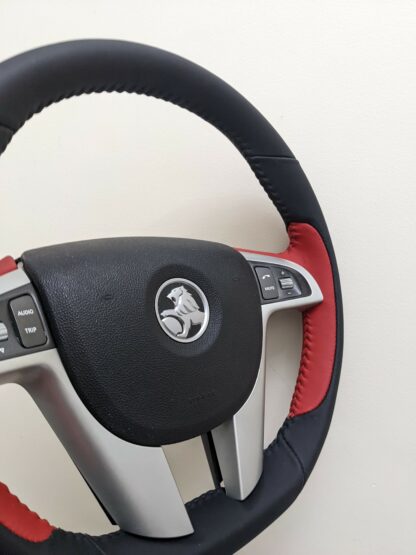 Holden VE HSV Clubsport Red and Black Nappy Leather Flat Bottom Steering Wheel